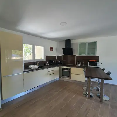Cuisine ou kitchenette dans l'établissement appartement Oliviaaxelle