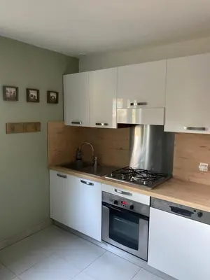 Cuisine ou kitchenette dans l'établissement Résidence 