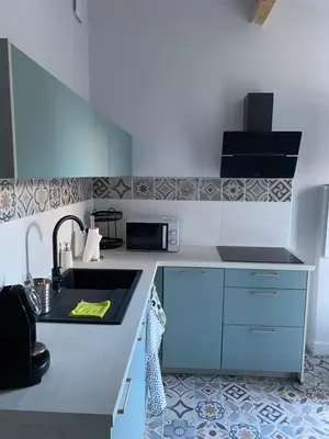 Cuisine ou kitchenette dans l'établissement Villa