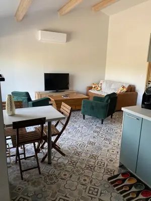 Télévision ou salle de divertissement dans l'établissement Villa