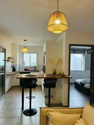 Coin salon dans l'établissement Appartement T2 Corte