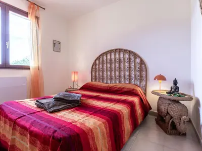 Un ou plusieurs lits dans un hébergement de l'établissement Holiday Home Agula Marina by Interhome