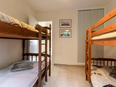 Un ou plusieurs lits dans un hébergement de l'établissement Holiday Home Agula Marina by Interhome
