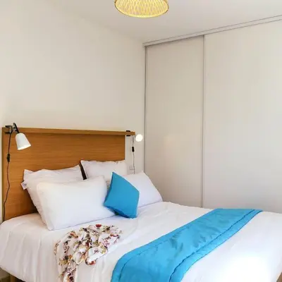 Un ou plusieurs lits dans un hébergement de l'établissement Appt T4 Accès Plage, piscine privée, clim N3-4