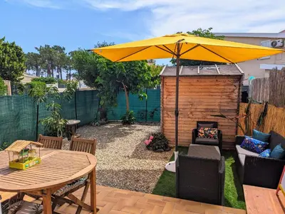 Jardin de l'établissement Maison pour 4 personnes en bord de mer