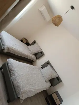 Un ou plusieurs lits dans un hébergement de l'établissement Dume et Coco F2 55 M2 Vue mer