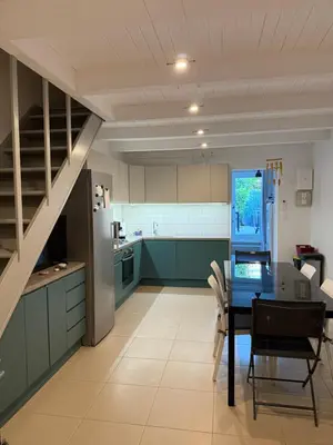 Cuisine ou kitchenette dans l'établissement Maison a la plage