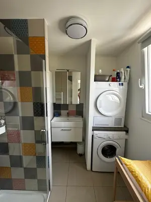Cuisine ou kitchenette dans l'établissement Maison a la plage