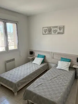 Un ou plusieurs lits dans un hébergement de l'établissement Corse villa T3 piscine