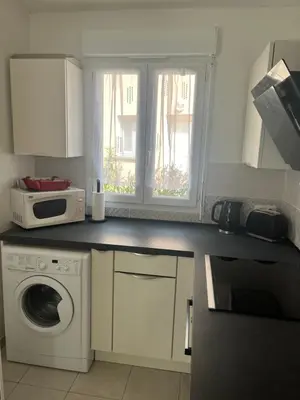 Cuisine ou kitchenette dans l'établissement Corse villa T3 piscine
