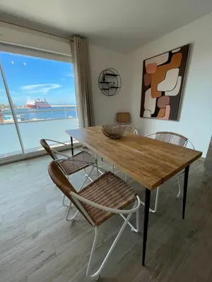 Coin salon dans l'établissement Residence Des Îles