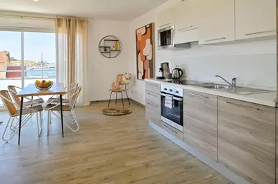 Cuisine ou kitchenette dans l'établissement Residence Des Îles