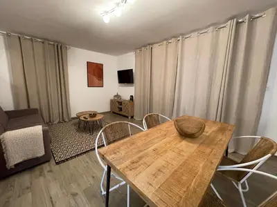 Télévision ou salle de divertissement dans l'établissement Residence Des Îles