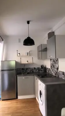 Cuisine ou kitchenette dans l'établissement APPARTEMENT CENTRE-Bastia à une minute à pied du port