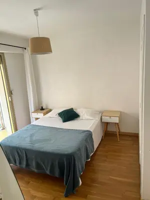 Un ou plusieurs lits dans un hébergement de l'établissement APPARTEMENT CENTRE-Bastia à une minute à pied du port