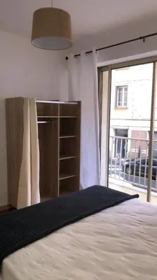 Un ou plusieurs lits dans un hébergement de l'établissement APPARTEMENT CENTRE-Bastia à une minute à pied du port