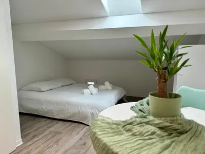 Un ou plusieurs lits dans un hébergement de l'établissement Chambre de charme à Evisa