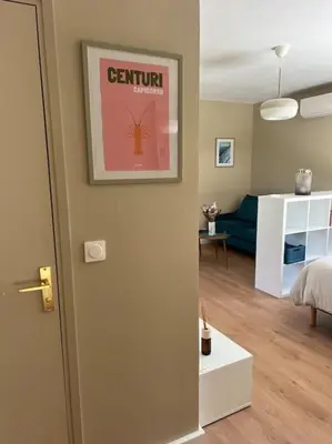 Un ou plusieurs lits dans un hébergement de l'établissement Studio Saint Florent