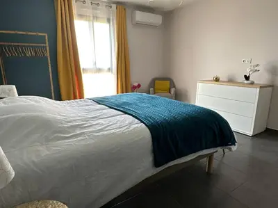 Un ou plusieurs lits dans un hébergement de l'établissement 5 min des plages - Appt 2 chambres A Casa Bella