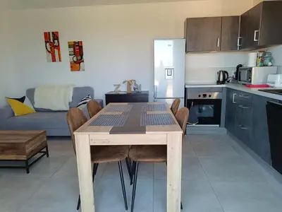 Cuisine ou kitchenette dans l'établissement Doume et Coco T1 30M2 Vue mer