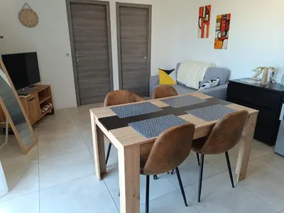 Coin salon dans l'établissement Doume et Coco T1 30M2 Vue mer