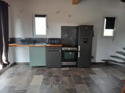 Cuisine ou kitchenette dans l'établissement maison de vacances olmi cappella Corse