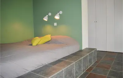 Un ou plusieurs lits dans un hébergement de l'établissement Cozy Home In San Giuliano With Wifi
