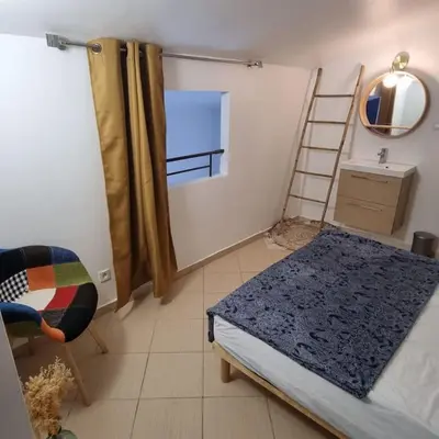 Un ou plusieurs lits dans un hébergement de l'établissement Maison en duplex dans résidence à 400m de la mer