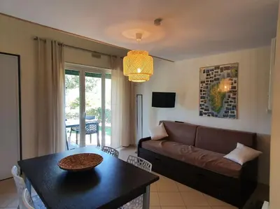 Coin salon dans l'établissement Maison en duplex dans résidence à 400m de la mer