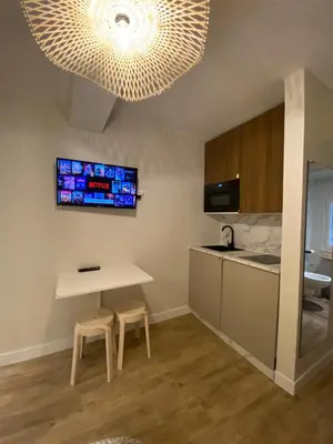 Cuisine ou kitchenette dans l'établissement Charmant studio hyper centre