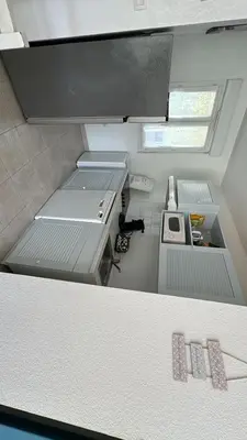Cuisine ou kitchenette dans l'établissement Ville melody