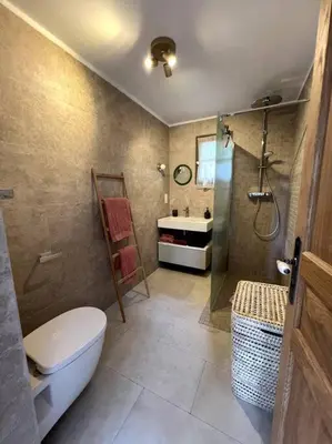 Salle de bains dans l'établissement Maison à la pointe du Cap Corse