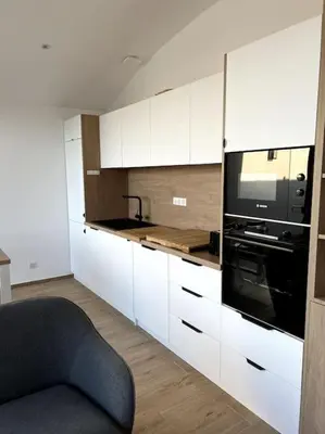 Cuisine ou kitchenette dans l'établissement Maison en bord de mer