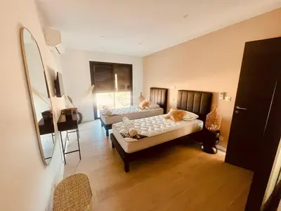 Un ou plusieurs lits dans un hébergement de l'établissement Villa Casa Damicella Bord de Mer avec Piscine