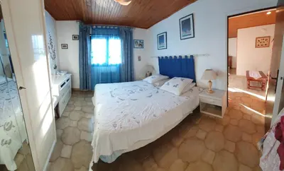 Un ou plusieurs lits dans un hébergement de l'établissement Appt cosy rez de villa