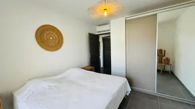Un ou plusieurs lits dans un hébergement de l'établissement Appartement T3 A Marina 2 LUMIO