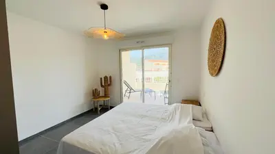 Un ou plusieurs lits dans un hébergement de l'établissement Appartement T3 A Marina 2 LUMIO