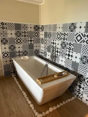 Salle de bains dans l'établissement Chambre de charme Andria jacuzzi