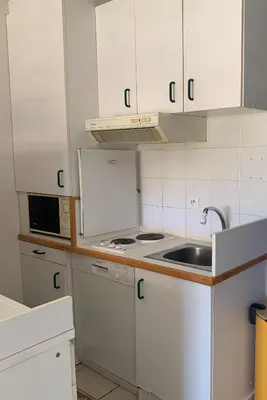 Cuisine ou kitchenette dans l'établissement Chez Aline - Appartement en bord de mer