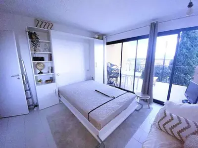 Un ou plusieurs lits dans un hébergement de l'établissement Studio vue mer à Sant'Ambroggio, Lumio
