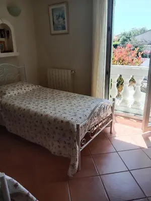 Un ou plusieurs lits dans un hébergement de l'établissement Maison des pruniers