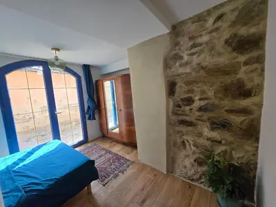 Un ou plusieurs lits dans un hébergement de l'établissement Maison de pêcheur du petit port