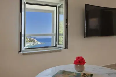 Télévision ou salle de divertissement dans l'établissement Casa Di U Mare
