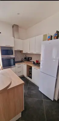Cuisine ou kitchenette dans l'établissement Maison Vacance Proche De Calvi