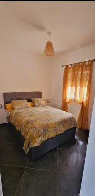 Un ou plusieurs lits dans un hébergement de l'établissement Maison Vacance Proche De Calvi