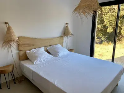 Un ou plusieurs lits dans un hébergement de l'établissement Casa Serena Plage de Lozari 5 kilomètres Ile Rousse 12 kilomètres