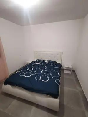 Un ou plusieurs lits dans un hébergement de l'établissement Villa t4