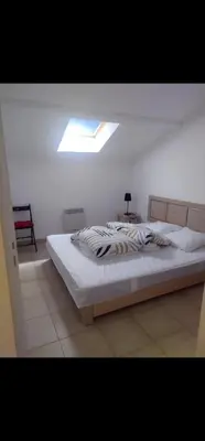 Un ou plusieurs lits dans un hébergement de l'établissement Appartement Corse