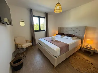 Un ou plusieurs lits dans un hébergement de l'établissement Residence I Pozzi