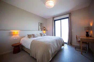 Un ou plusieurs lits dans un hébergement de l'établissement Villa vue mer Cap Corse